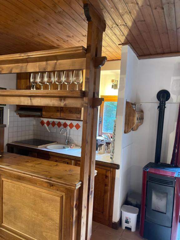 a kitchen with a counter with pots and pans at La quattordici in Livata
