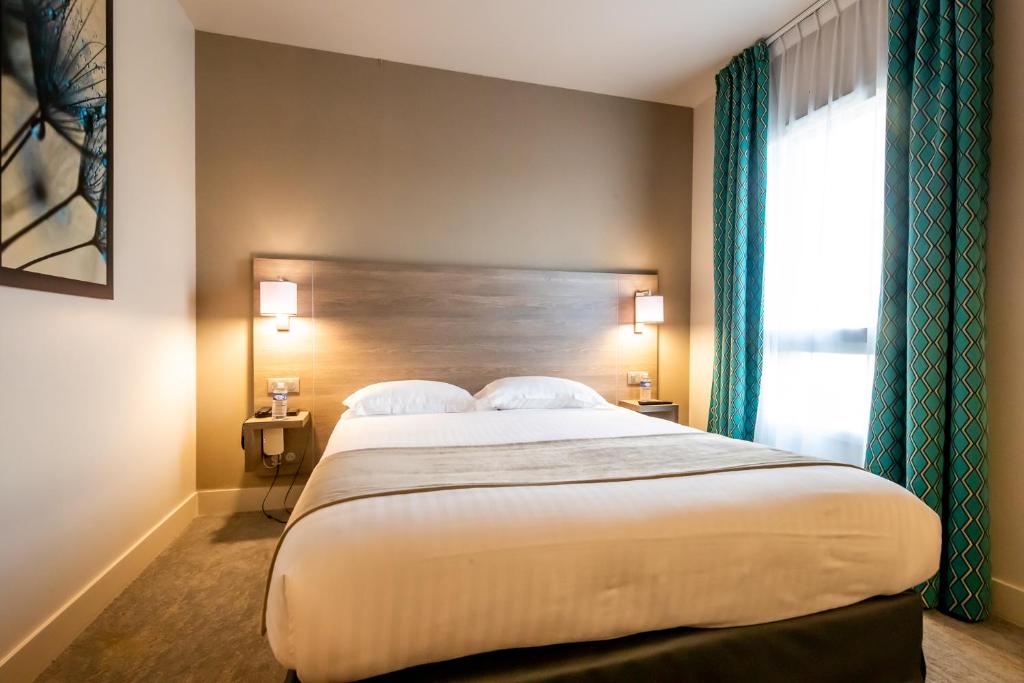Postel nebo postele na pokoji v ubytování Best Western Eden SPA
