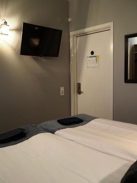 Postel nebo postele na pokoji v ubytování Hotel Söder