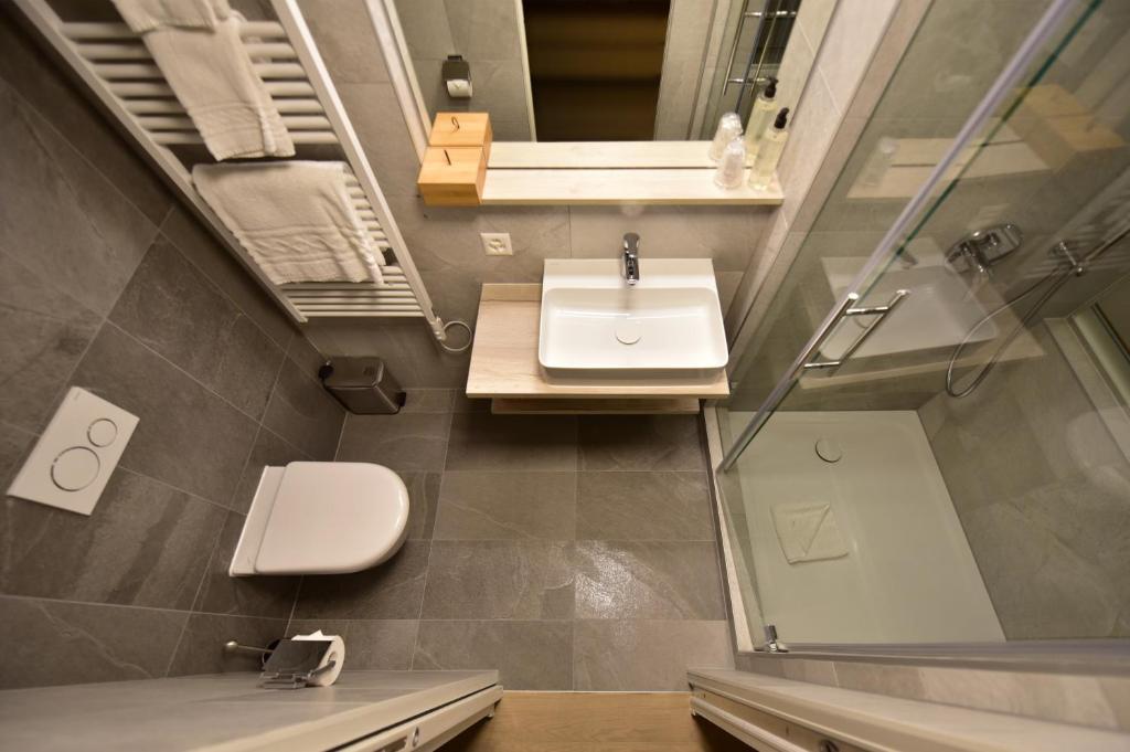 Koupelna v ubytování Hotel Rousseau