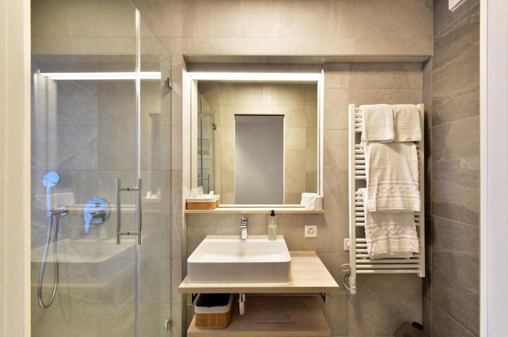Koupelna v ubytování Hotel Rousseau