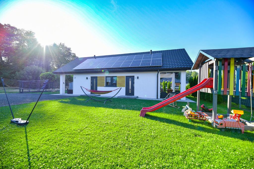 Herní místnost nebo prostor pro děti v ubytování Domki Pod Skarpą Zator