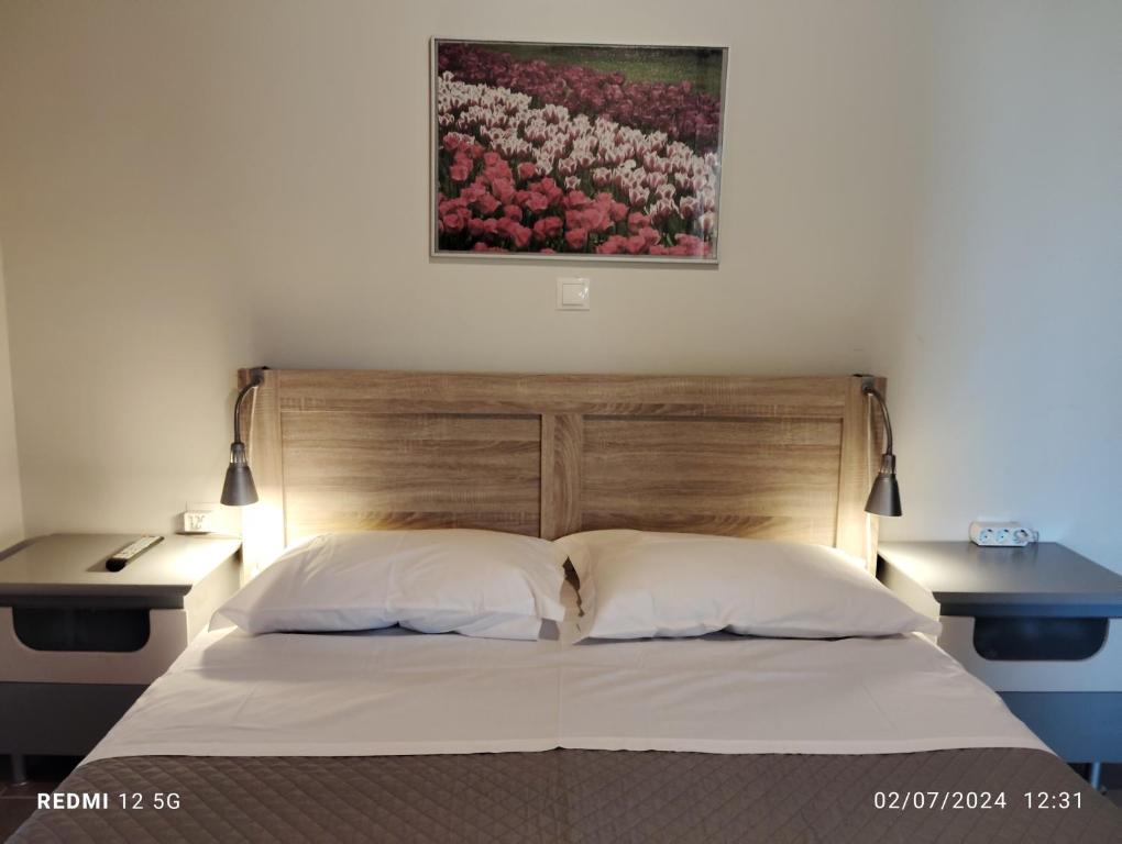 Postel nebo postele na pokoji v ubytování Havouli Cottage