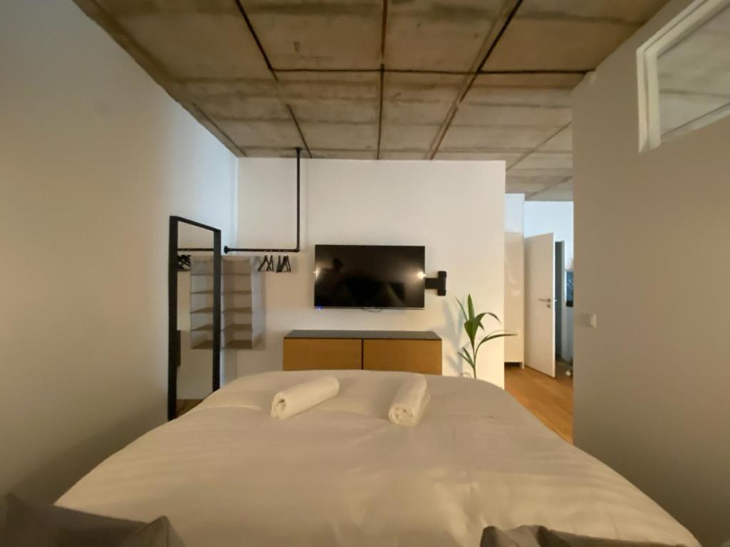 Postel nebo postele na pokoji v ubytování JetaHome