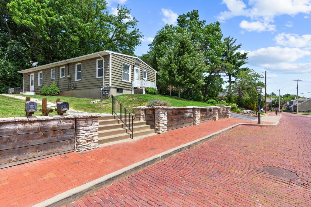 a brick road in front of a house at Charming Duplex on Main in St. Charles