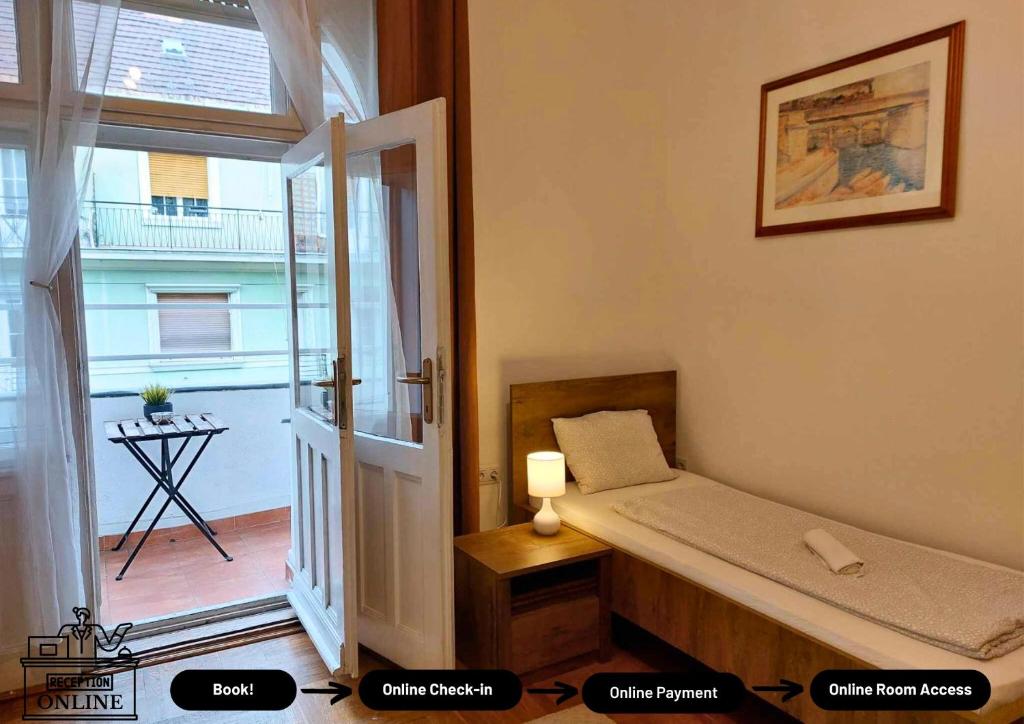 Posteľ alebo postele v izbe v ubytovaní Black Sheep Budapest Smart Rooms