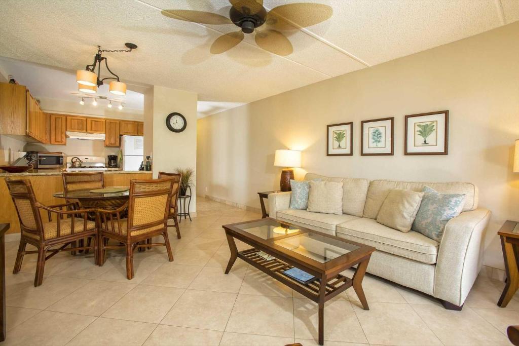 a living room with a couch and a table at Kihei Akahi Resort - Unit C313 in Wailea