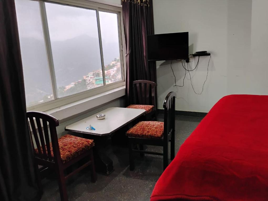 Postel nebo postele na pokoji v ubytování HOTEL GRAND GLORRYy