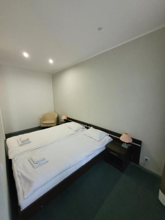 Postel nebo postele na pokoji v ubytování Artel Villa Tarsis