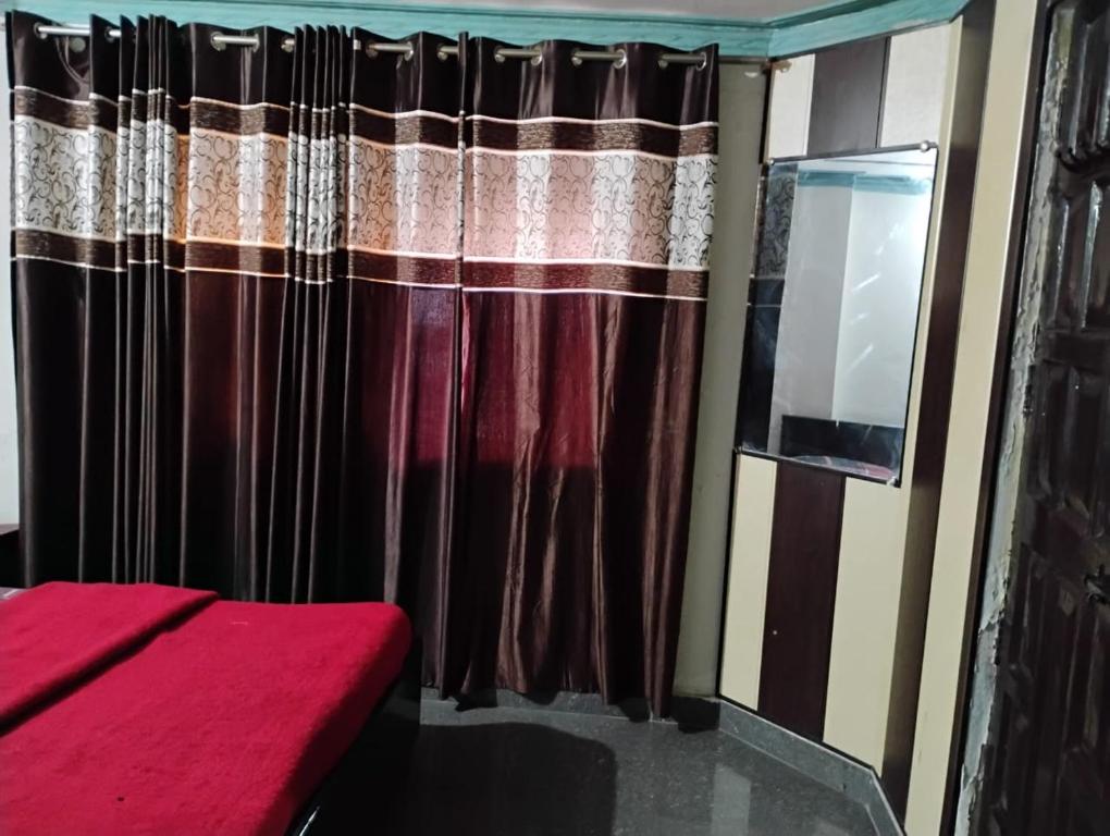 Postel nebo postele na pokoji v ubytování HOTEL GRAND GLORRYy