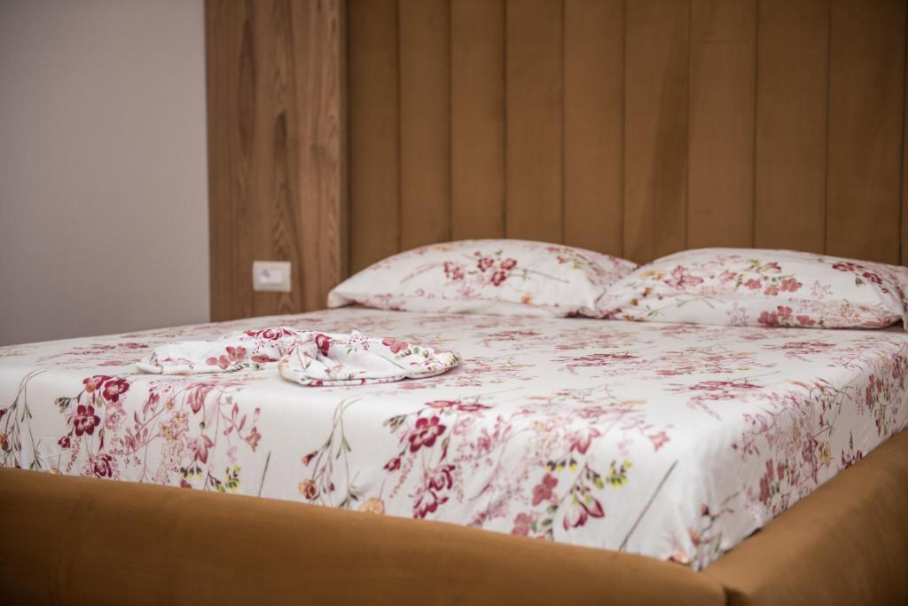 Postel nebo postele na pokoji v ubytování New Donantelo Hotel