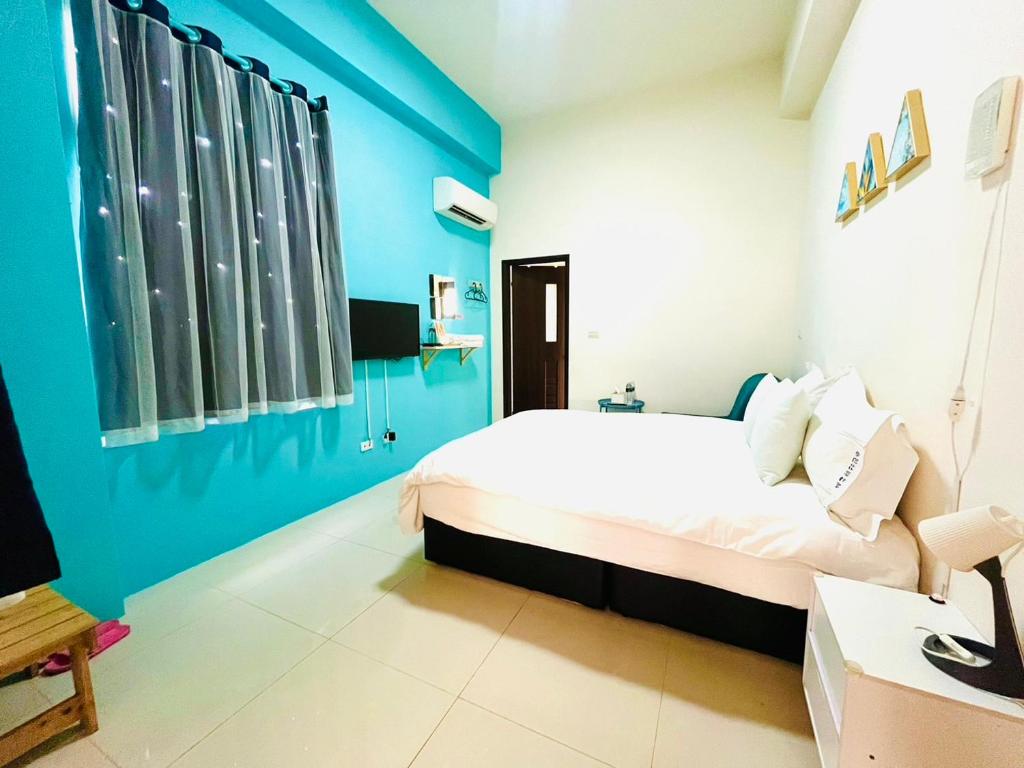 Postel nebo postele na pokoji v ubytování Monkey Travel B&B