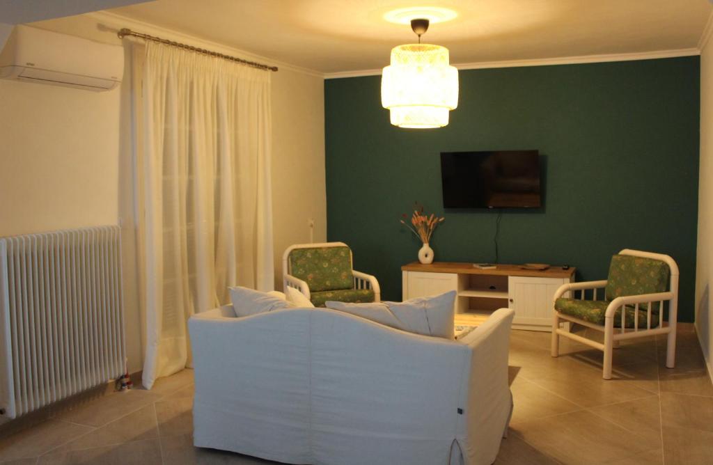 TV a/nebo společenská místnost v ubytování Yolanda 's House