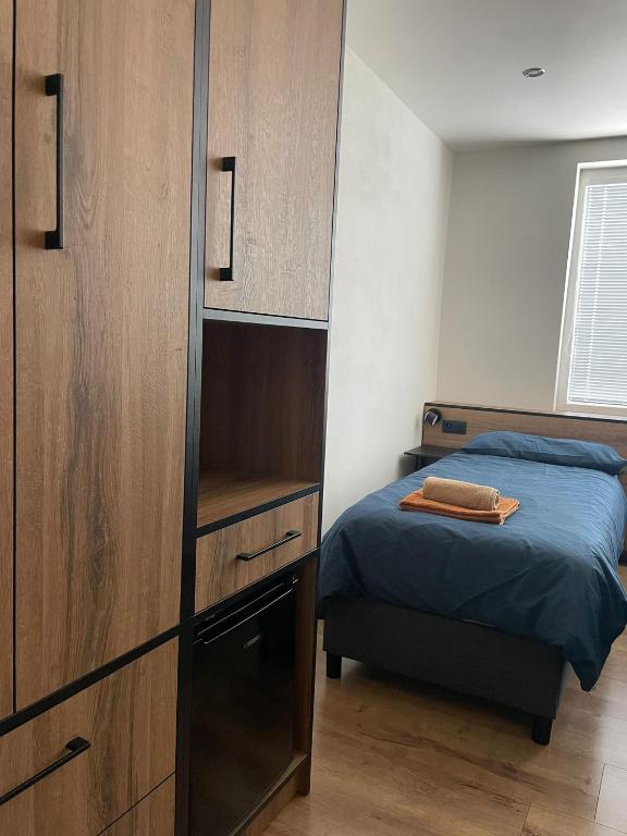 Postel nebo postele na pokoji v ubytování Apartmánový dom Ametyst