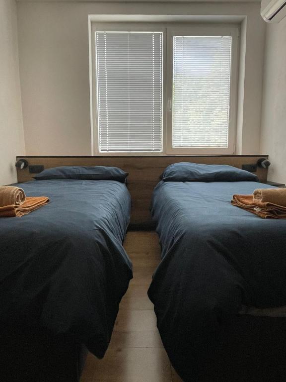Postel nebo postele na pokoji v ubytování Apartmánový dom Ametyst