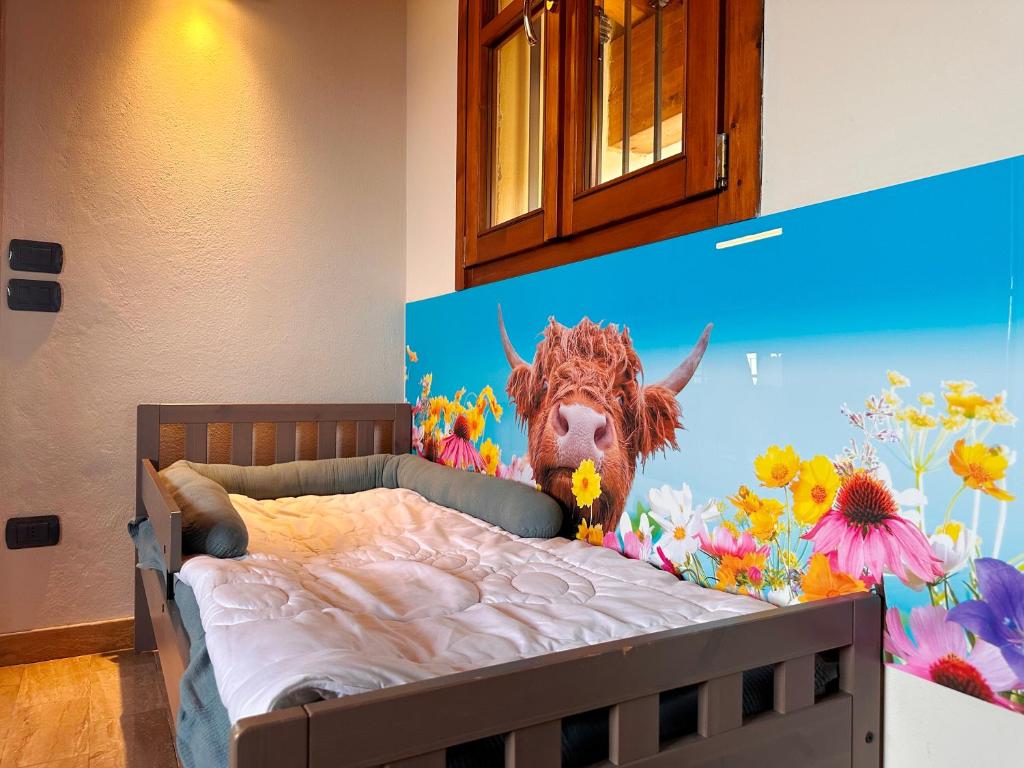 Postel nebo postele na pokoji v ubytování LOFT GARDASEE