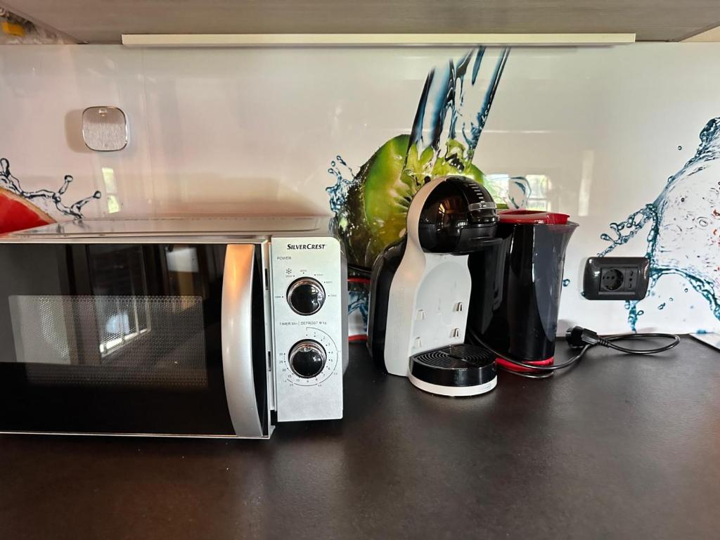 Kuchyň nebo kuchyňský kout v ubytování LOFT GARDASEE