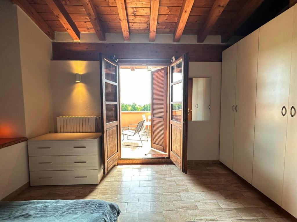 Postel nebo postele na pokoji v ubytování LOFT GARDASEE