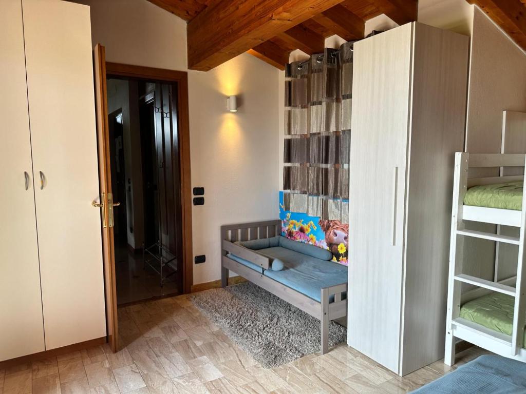 Postel nebo postele na pokoji v ubytování LOFT GARDASEE
