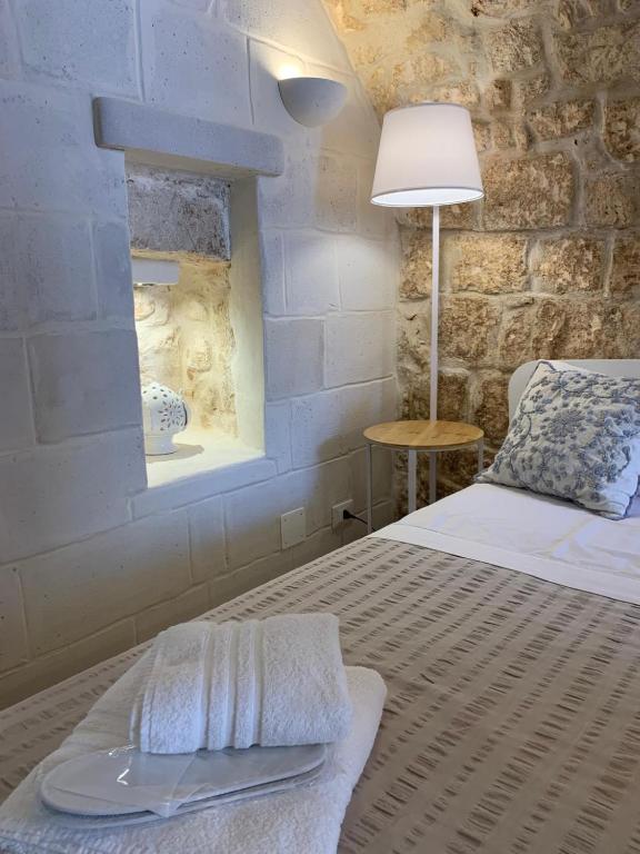 Postel nebo postele na pokoji v ubytování Atagio luxury room