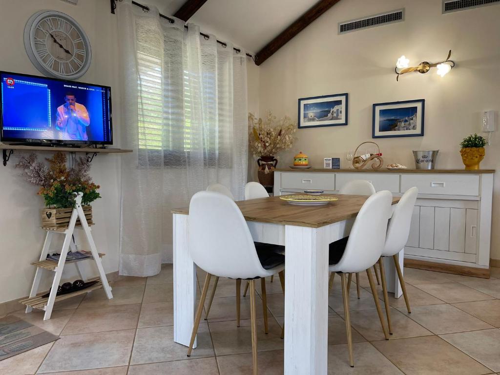 Telewizja i/lub zestaw kina domowego w obiekcie VILLA ANNA MARIA