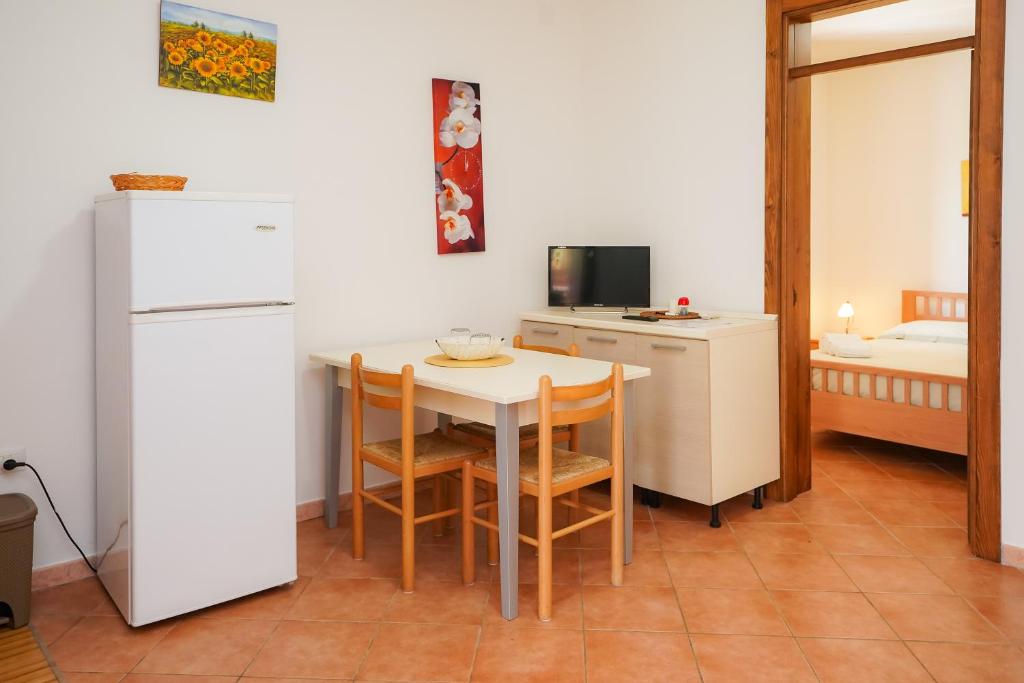 A kitchen or kitchenette at Casa Vacanza Russo Fernando