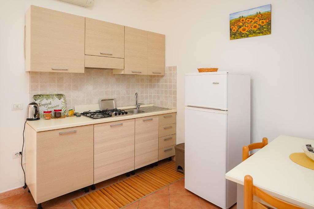A kitchen or kitchenette at Casa Vacanza Russo Fernando