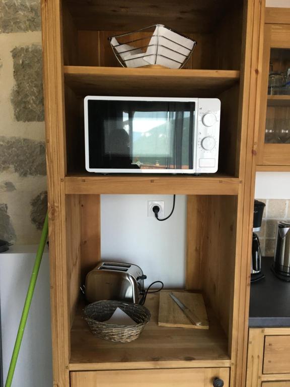Kuchyň nebo kuchyňský kout v ubytování Gîte La Liaucoussette