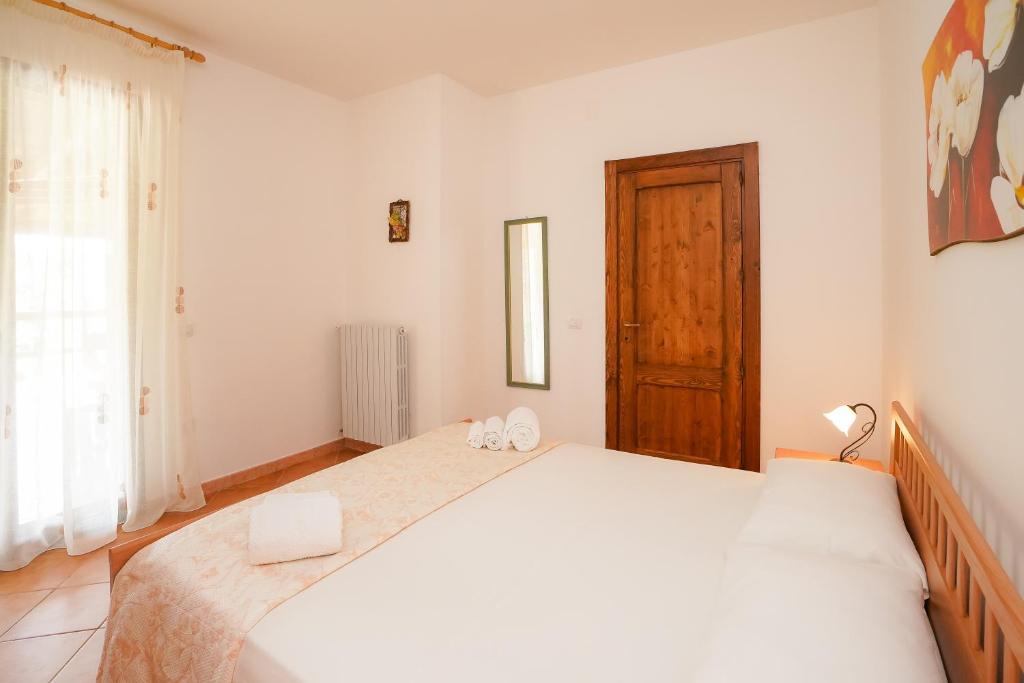 A bed or beds in a room at Casa Vacanza Russo Fernando