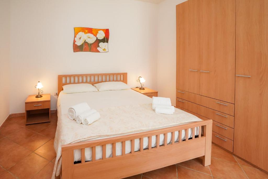 A bed or beds in a room at Casa Vacanza Russo Fernando