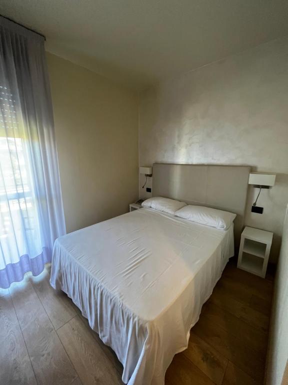 Postel nebo postele na pokoji v ubytování Hotel Parigi 2 & Spa