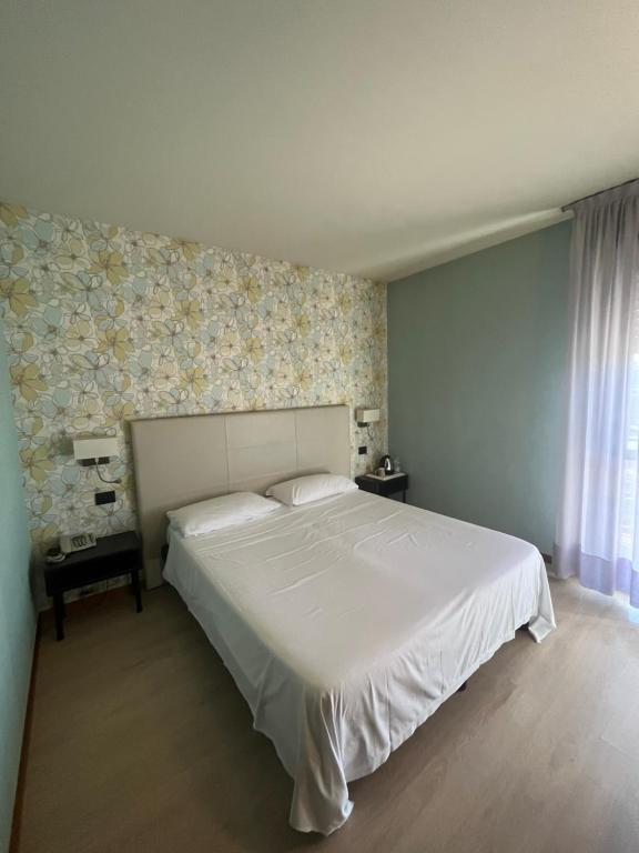 Postel nebo postele na pokoji v ubytování Hotel Parigi 2 & Spa