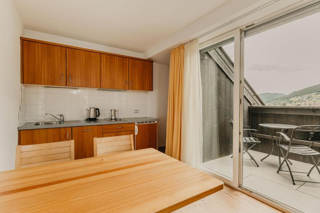 Kuchyň nebo kuchyňský kout v ubytování Hotel Garni Planaces