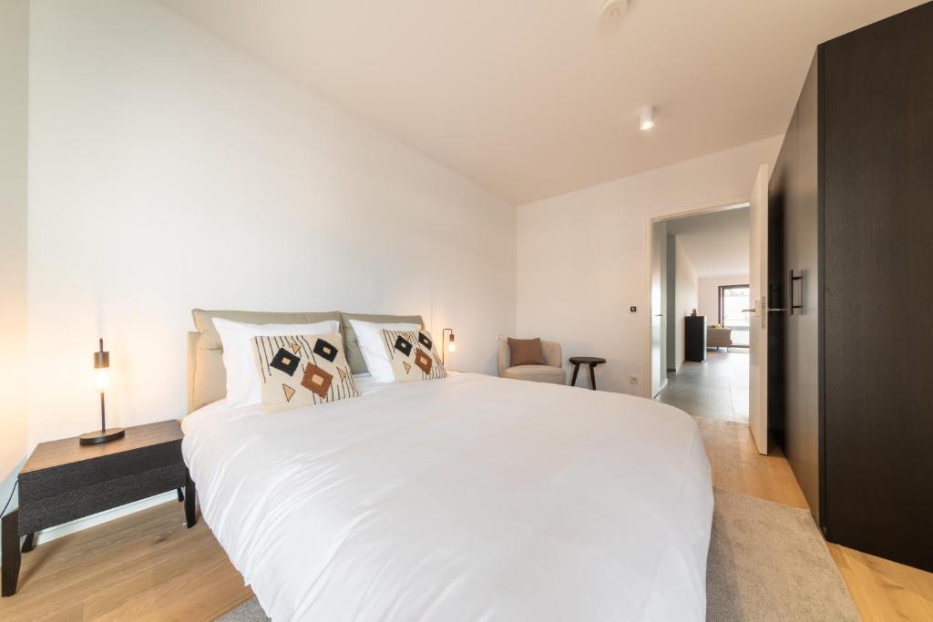 Postel nebo postele na pokoji v ubytování Halternative Residence Renaissance