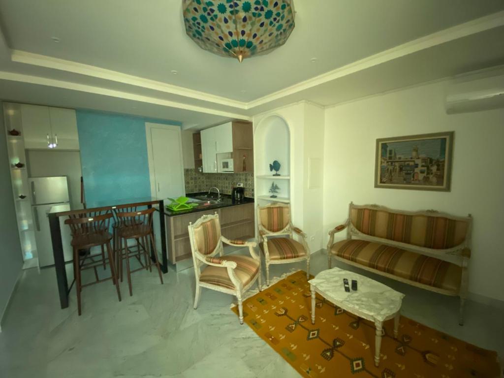 Posezení v ubytování Marsa - Sidi Bousaid Lovely Authentic Apartment