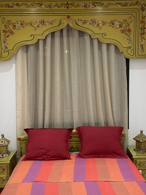 Postel nebo postele na pokoji v ubytování Marsa - Sidi Bousaid Lovely Authentic Apartment