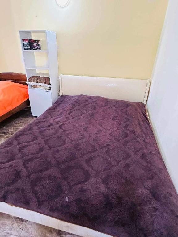 Postel nebo postele na pokoji v ubytování Cozy Flat N2