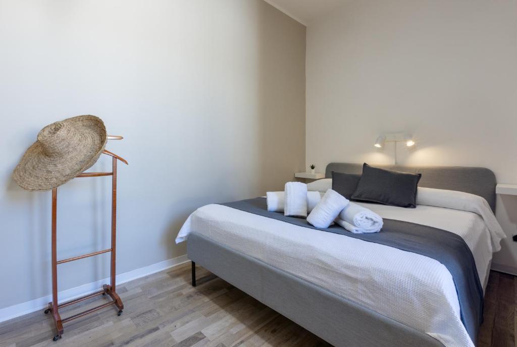 A bed or beds in a room at Max Apartment