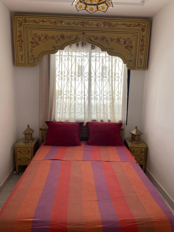 Postel nebo postele na pokoji v ubytování Marsa - Sidi Bousaid Lovely Authentic Apartment