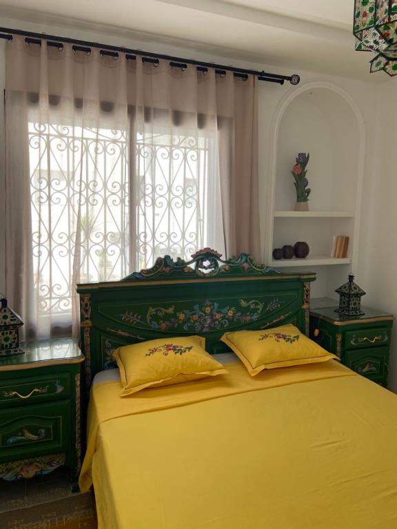 Postel nebo postele na pokoji v ubytování Marsa - Sidi Bousaid Lovely Authentic Apartment