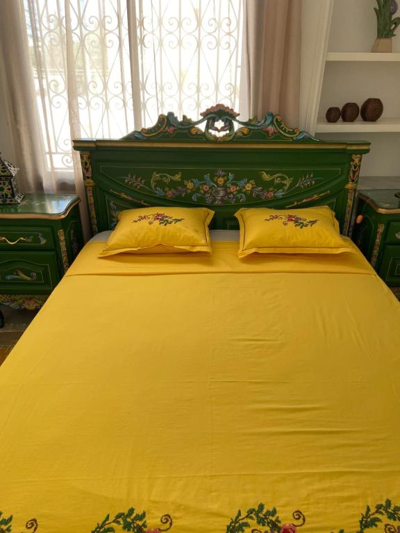 Postel nebo postele na pokoji v ubytování Marsa - Sidi Bousaid Lovely Authentic Apartment