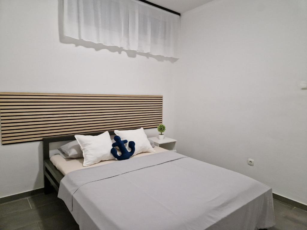 Posteľ alebo postele v izbe v ubytovaní Aurelia Apartments, Vir