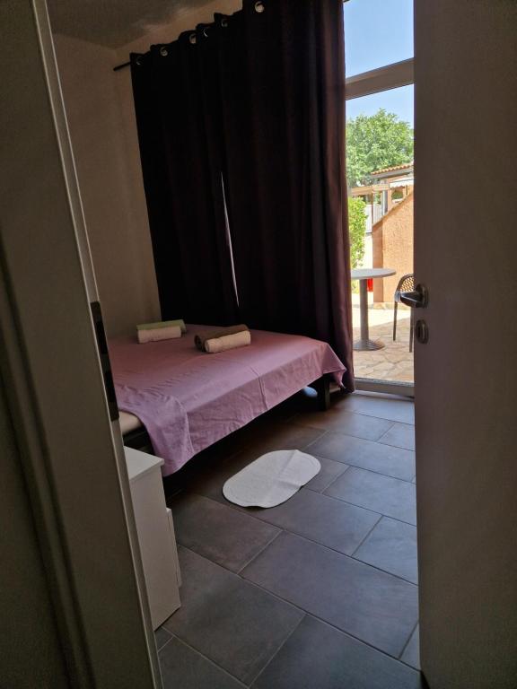 Posteľ alebo postele v izbe v ubytovaní Aurelia Apartments, Vir