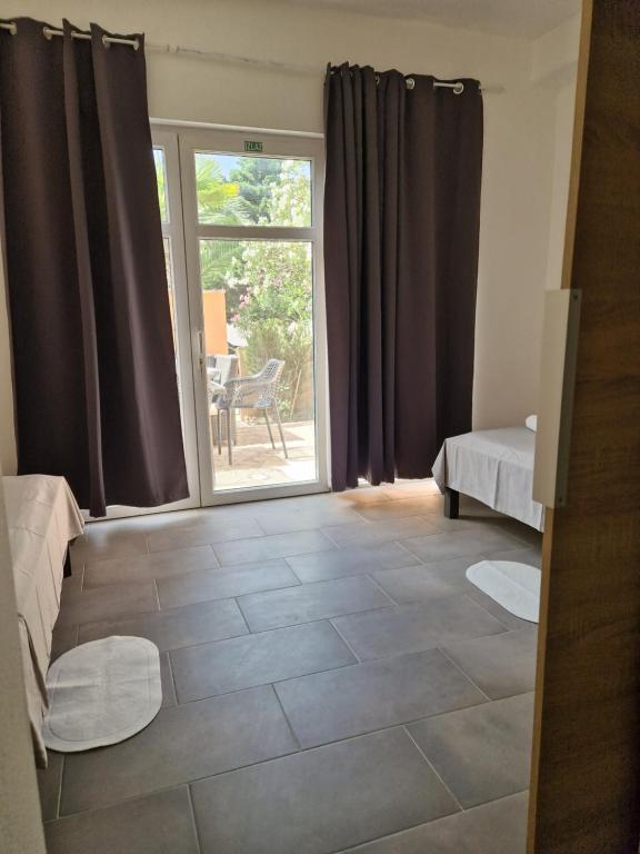 Posteľ alebo postele v izbe v ubytovaní Aurelia Apartments, Vir