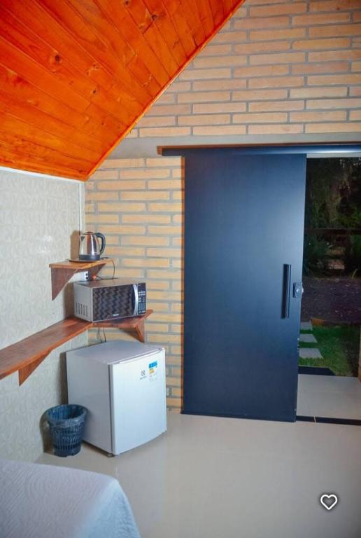 Kuchyň nebo kuchyňský kout v ubytování Hotel e Pousada Cabanas Arbor