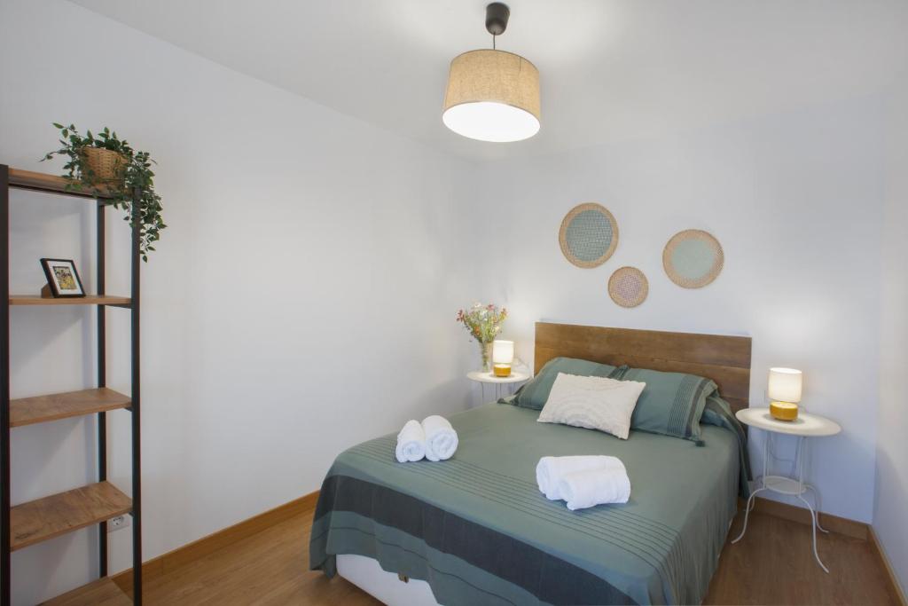 Postel nebo postele na pokoji v ubytování Apartamento turístico Ana