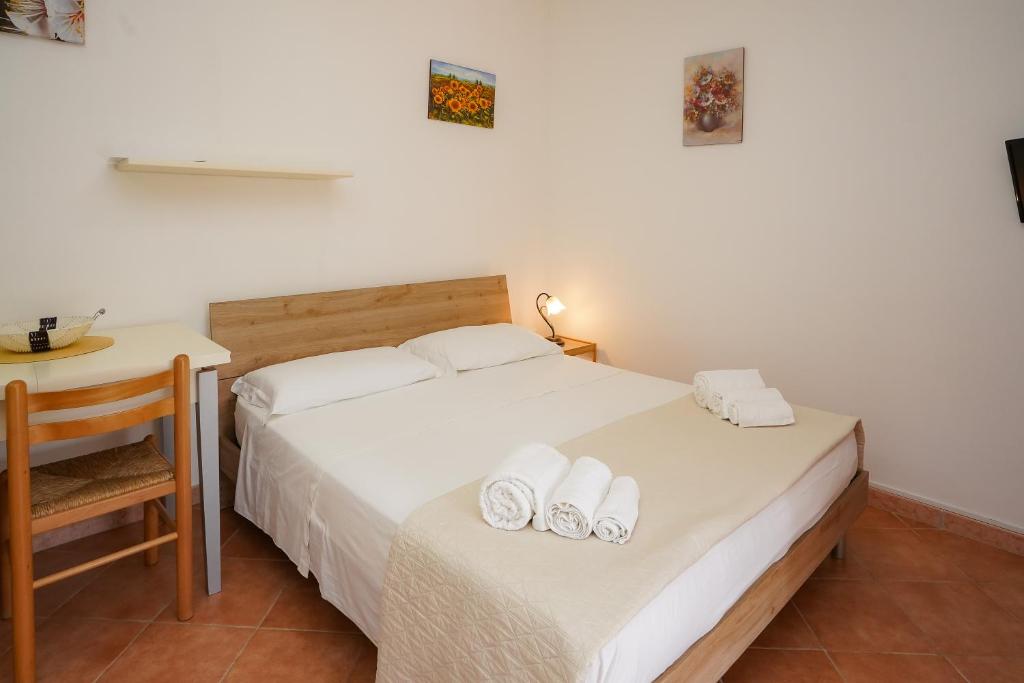 A bed or beds in a room at Casa Vacanza Russo Fernando