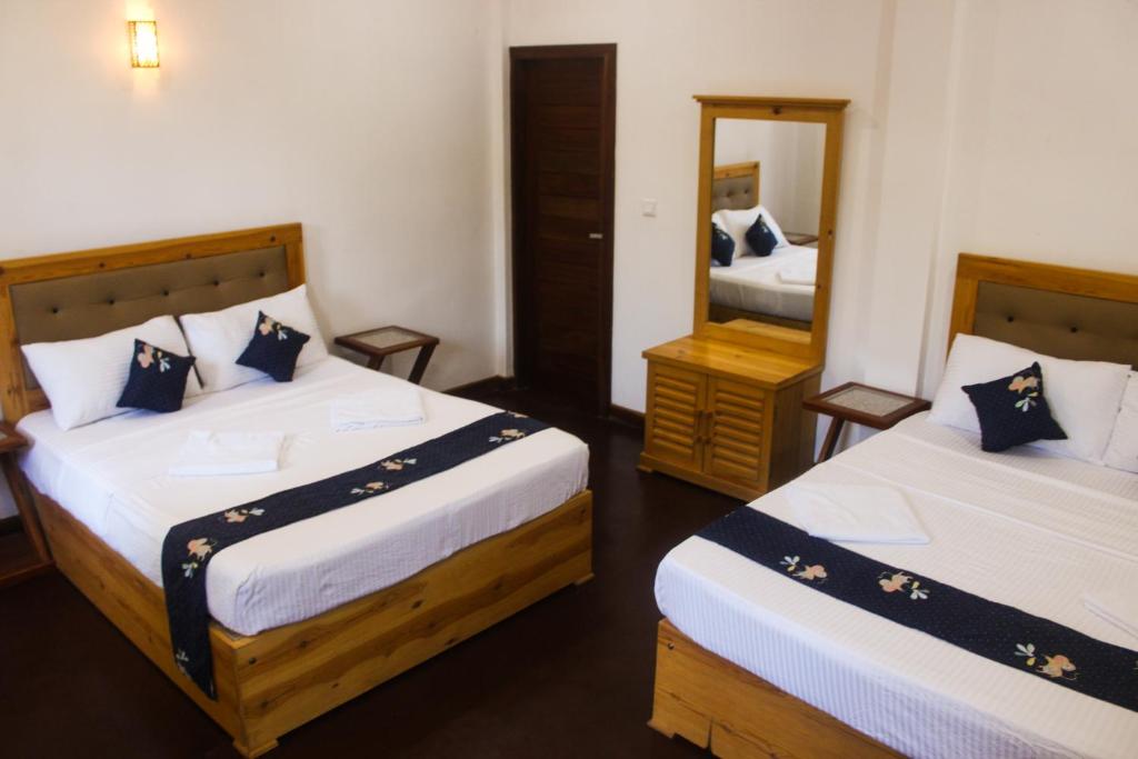 Postel nebo postele na pokoji v ubytování Sierra Mount Villa