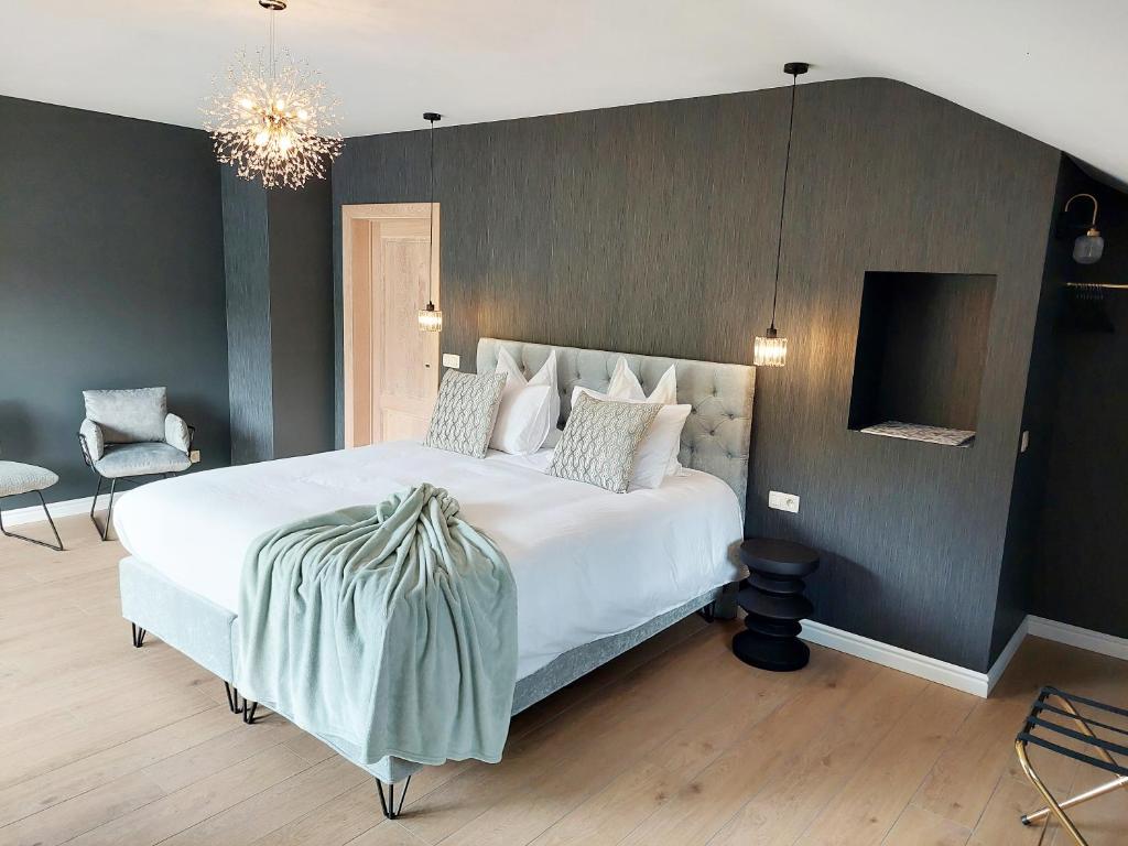 Postel nebo postele na pokoji v ubytování Cha Cha de Loup Luxe B&B - Vakantiewoning