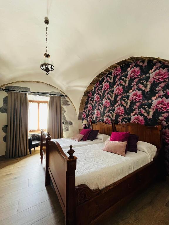 Postel nebo postele na pokoji v ubytování Hotel Larrañaga